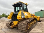 Back of used dozer in yard for Sale